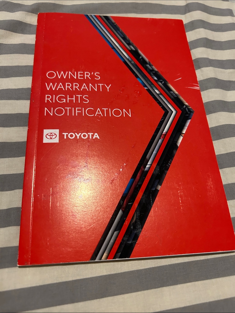 Toyota Red Owner's Warranty Rights Notification Booklet